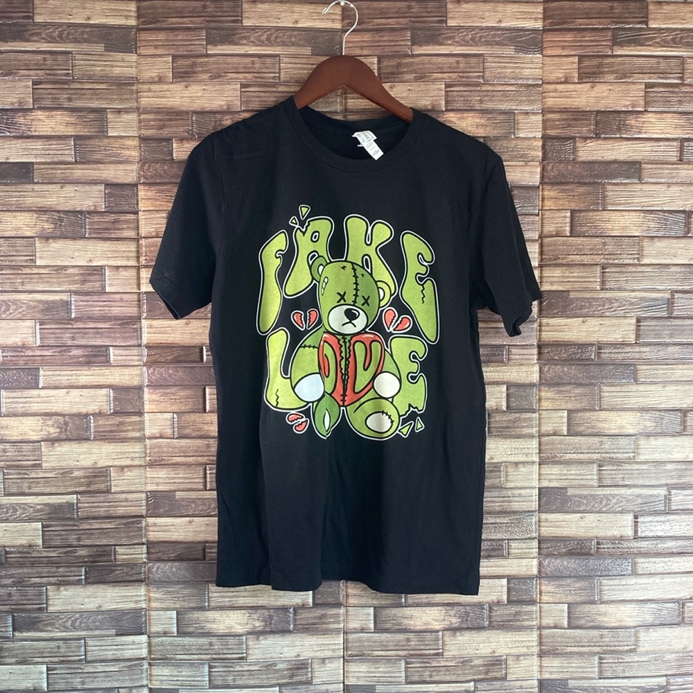Unisex EUC Bella+Canvas Black & Green “Fake Love” Teddy T Shirt